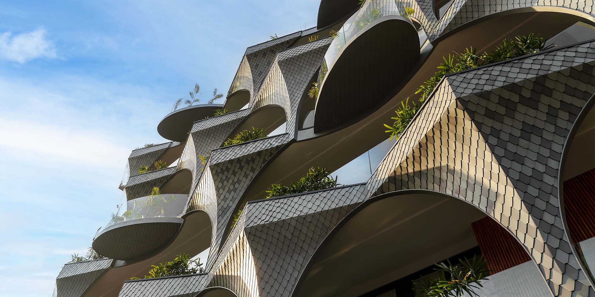 Parametric aluminium facade design for climate responsive building in India
