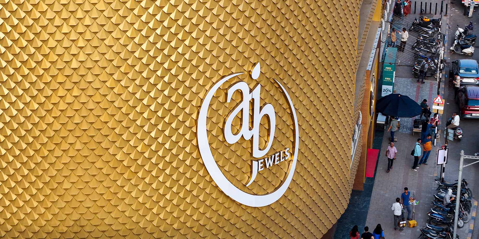 Retail building metal facade cladding with parametric design pattern and branding integration in India