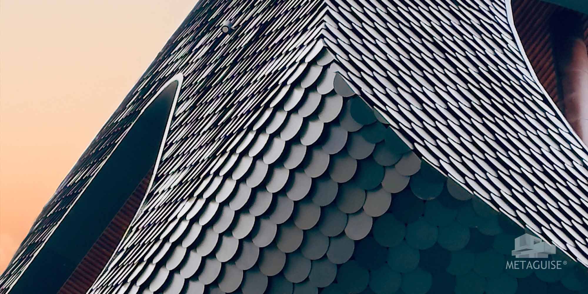 Metaguise MetaShingles aluminium shingle cladding on luxury home exterior – tile replacement facade system