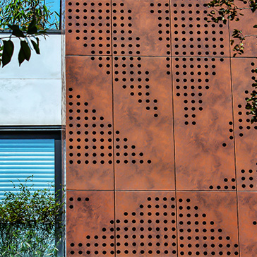 Coin Facade vs. Perforated Panels: Which Metal Cladding System Is Right for You