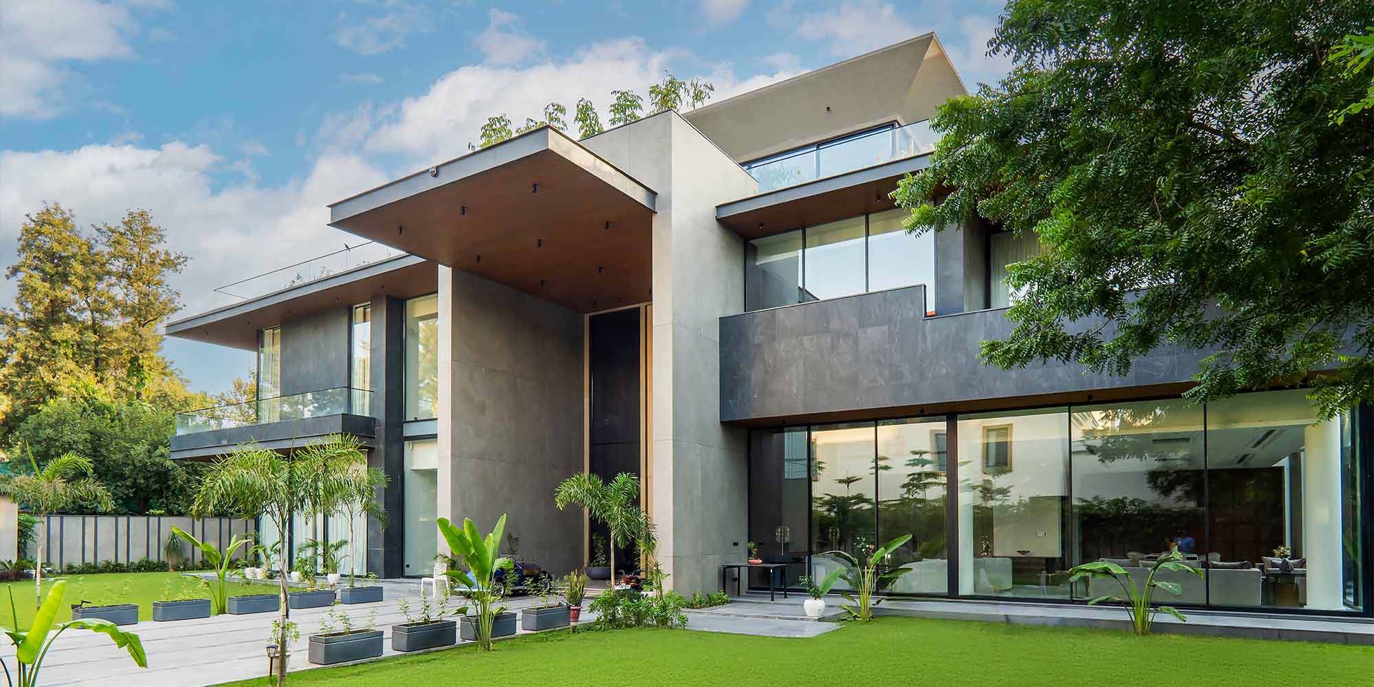 Metaguise luxury villa exterior facade design — MetaSequin and MetaWood cladding systems on premium residential building India